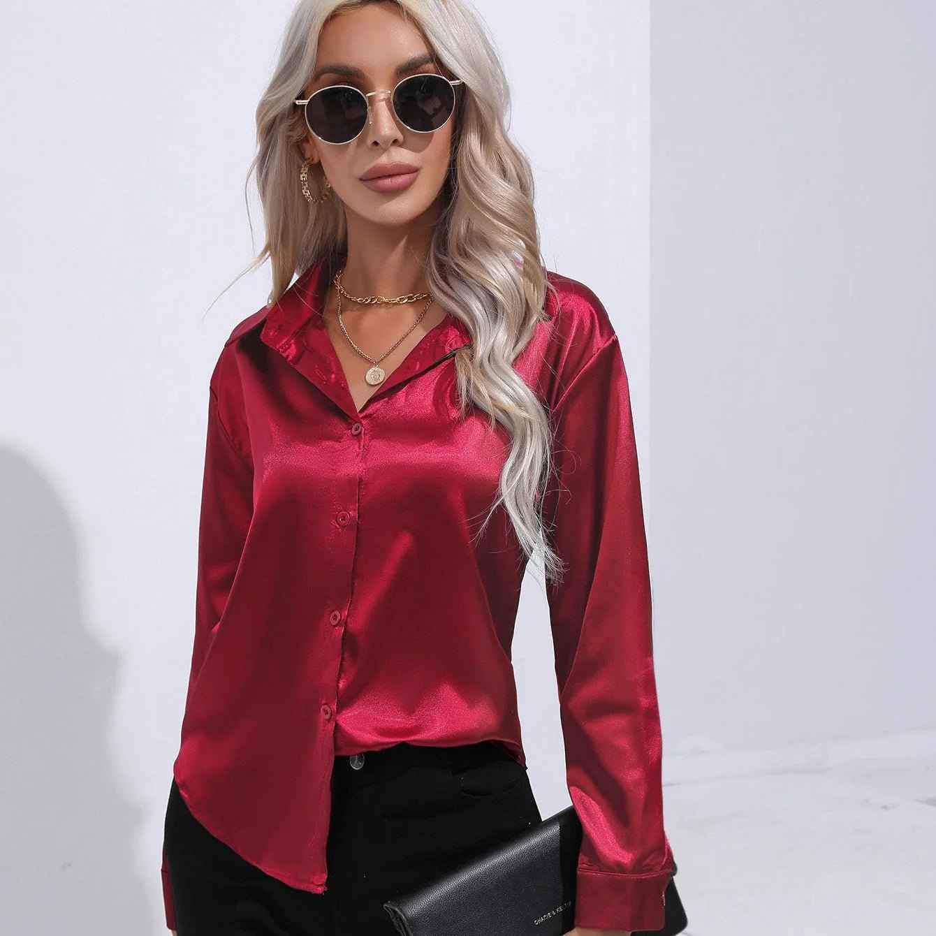 Dames blouse met glansfinish en knoopsluiting