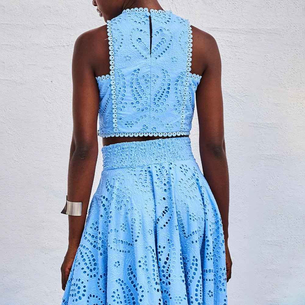 Dames set met geborduurd crop-top en maxirok